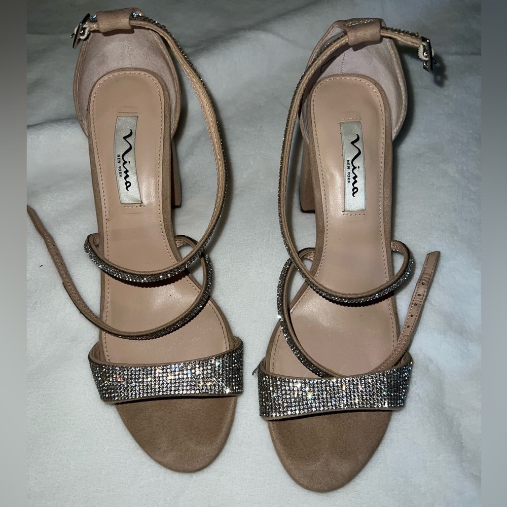 Nude heels with rhinestones.